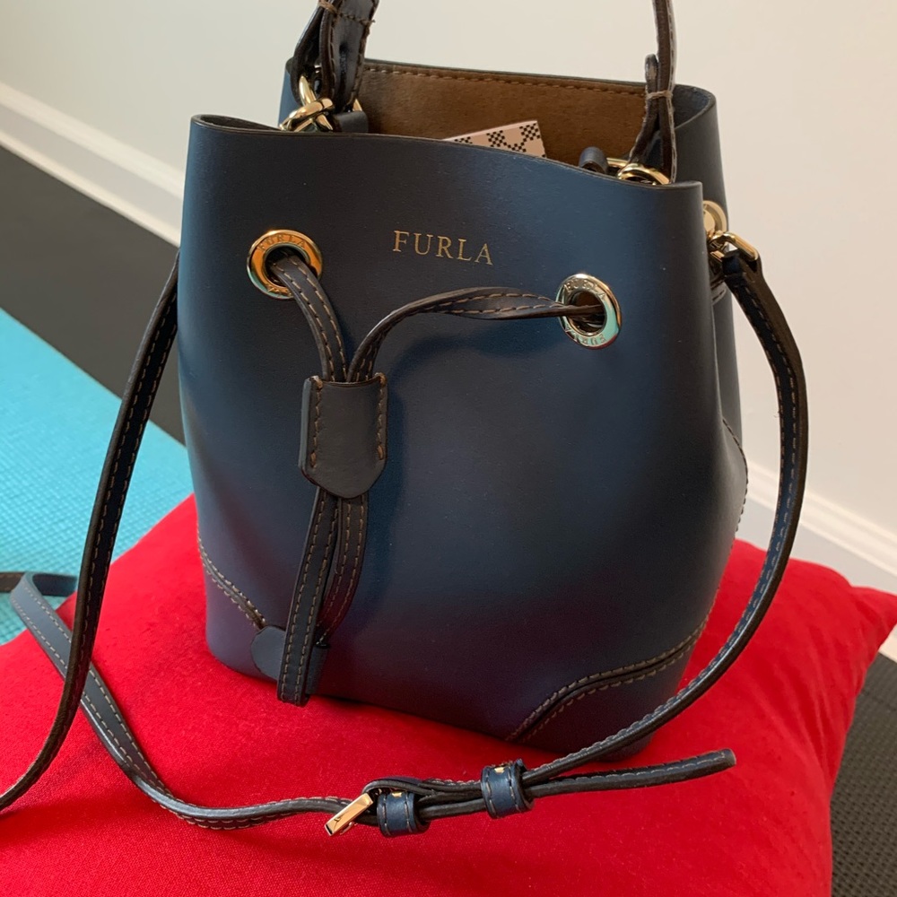 Furla marine blue crossbody small bucket bag.